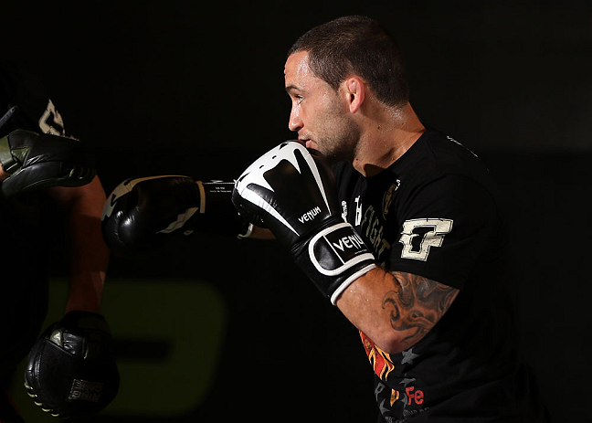 DENVER, CO - AUGUST 08:  Frankie Edgar works out for the media during the UFC 150 open workouts at the Muscle Pharm Sports Science Center on August 8, 2012 in Denver, Colorado. (Photo by Josh Hedges/Zuffa LLC/Zuffa LLC via Getty Images)