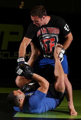 DENVER, CO - AUGUST 08:  Jake Shields works out for the media during the UFC 150 open workouts at the Muscle Pharm Sports Science Center on August 8, 2012 in Denver, Colorado. (Photo by Josh Hedges/Zuffa LLC/Zuffa LLC via Getty Images)