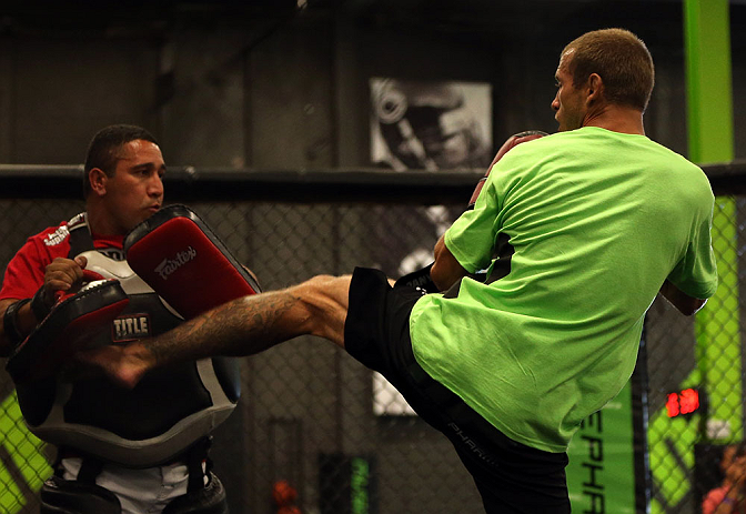 DENVER, CO - AUGUST 08:  Donald "Cowboy" Cerrone works out for the media during the UFC 150 open workouts at the Muscle Pharm Sports Science Center on August 8, 2012 in Denver, Colorado. (Photo by Josh Hedges/Zuffa LLC/Zuffa LLC via Getty Images)