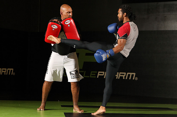 DENVER, CO - AUGUST 08:  Benson Henderson works out for the media during the UFC 150 open workouts at the Muscle Pharm Sports Science Center on August 8, 2012 in Denver, Colorado. (Photo by Josh Hedges/Zuffa LLC/Zuffa LLC via Getty Images)