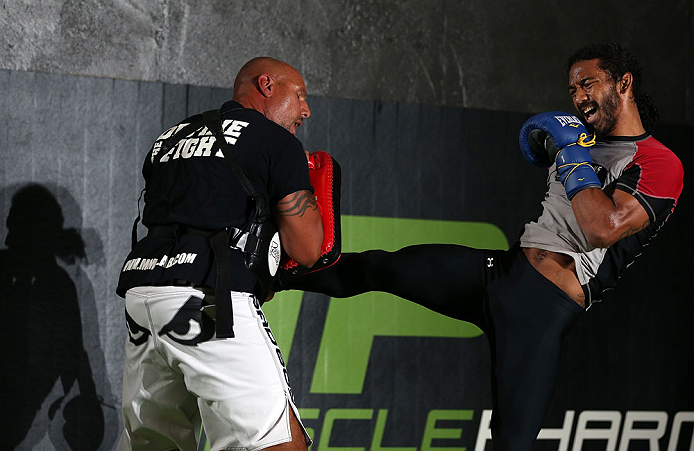 DENVER, CO - AUGUST 08:  Benson Henderson works out for the media during the UFC 150 open workouts at the Muscle Pharm Sports Science Center on August 8, 2012 in Denver, Colorado. (Photo by Josh Hedges/Zuffa LLC/Zuffa LLC via Getty Images)