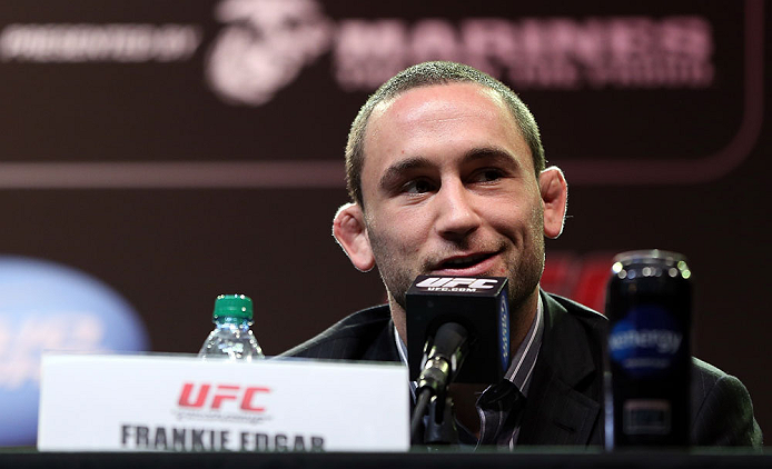 DENVER, CO - AUGUST 09:  Frankie Edgar interacts with media and fans during the UFC 150 press conference at the Fillmore Auditorium on August 9, 2012 in Denver, Colorado. (Photo by Josh Hedges/Zuffa LLC/Zuffa LLC via Getty Images)