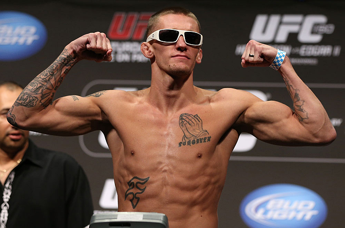 DENVER, CO - AUGUST 10: Dustin Pague makes weight during the UFC 150 weigh in at Pepsi Center on August 10, 2012 in Denver, Colorado. (Photo by Josh Hedges/Zuffa LLC/Zuffa LLC via Getty Images)