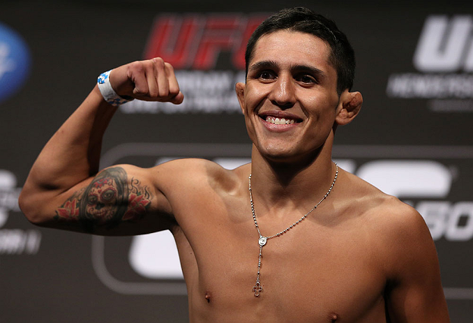 DENVER, CO - AUGUST 10: Erik Perez makes weight during the UFC 150 weigh in at Pepsi Center on August 10, 2012 in Denver, Colorado. (Photo by Josh Hedges/Zuffa LLC/Zuffa LLC via Getty Images)