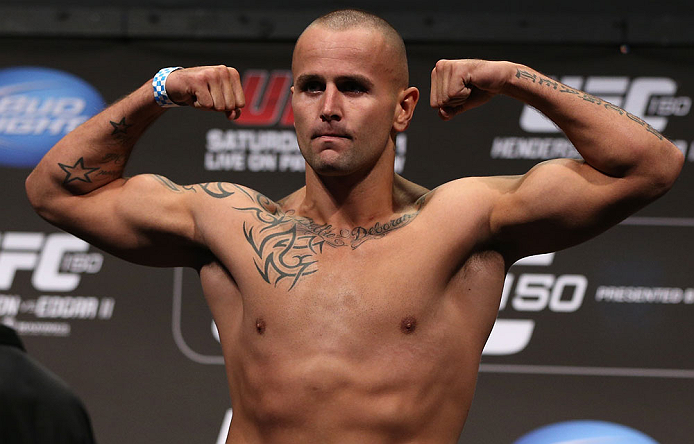 DENVER, CO - AUGUST 10:  Michael Kuiper makes weight during the UFC 150 weigh in at Pepsi Center on August 10, 2012 in Denver, Colorado. (Photo by Josh Hedges/Zuffa LLC/Zuffa LLC via Getty Images)