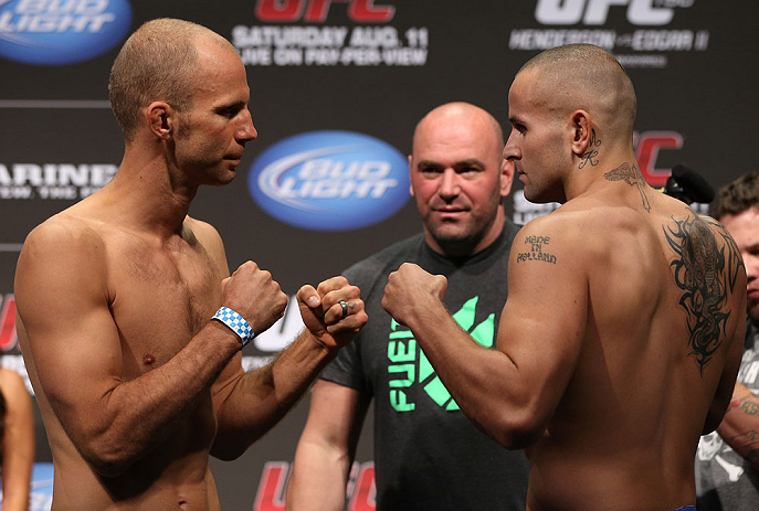 DENVER, CO - AUGUST 10: (L-R) Opponents Jared Hamman and Michael Kuiper face off during the UFC 150 weigh in at Pepsi Center on August 10, 2012 in Denver, Colorado. (Photo by Josh Hedges/Zuffa LLC/Zuffa LLC via Getty Images)