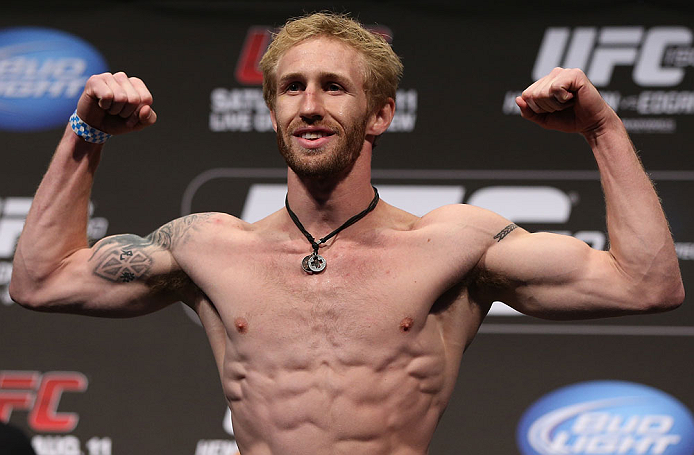 DENVER, CO - AUGUST 10:  Tom Hayden makes weight during the UFC 150 weigh in at Pepsi Center on August 10, 2012 in Denver, Colorado. (Photo by Josh Hedges/Zuffa LLC/Zuffa LLC via Getty Images)