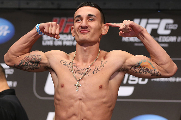 DENVER, CO - AUGUST 10: Max Holloway makes weight during the UFC 150 weigh in at Pepsi Center on August 10, 2012 in Denver, Colorado. (Photo by Josh Hedges/Zuffa LLC/Zuffa LLC via Getty Images)