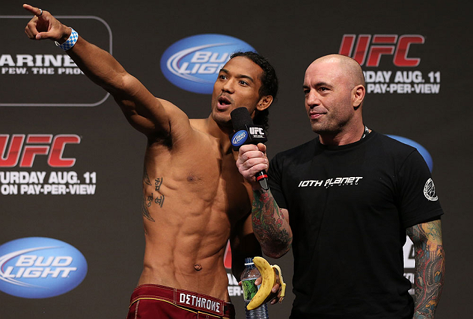 DENVER, CO - AUGUST 10: (L-R) Benson Henderson is interviewed by Joe Rogan during the UFC 150 weigh in at Pepsi Center on August 10, 2012 in Denver, Colorado. (Photo by Josh Hedges/Zuffa LLC/Zuffa LLC via Getty Images)