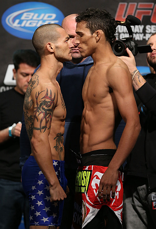 TORONTO, CANADA - SEPTEMBER 21: (L-R) Opponents Cub Swanson and Charles Oliveira face off during the UFC 152 weigh in at Mattamy Athletic Centre at the Gardens on September 21, 2012 in Toronto, Ontario, Canada. (Photo by Josh Hedges/Zuffa LLC/Zuffa LLC via Getty Images)
