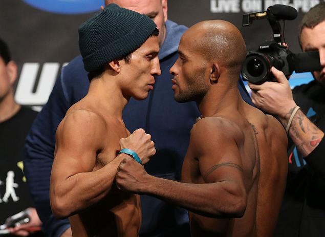 TORONTO, CANADA - SEPTEMBER 21: (L-R) Opponents Joseph Benavidez and Demetrious Johnson face off during the UFC 152 weigh in at Mattamy Athletic Centre at the Gardens on September 21, 2012 in Toronto, Ontario, Canada. (Photo by Josh Hedges/Zuffa LLC/Zuffa LLC via Getty Images)