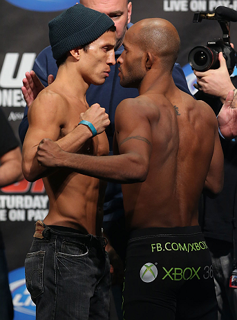 TORONTO, CANADA - SEPTEMBER 21: (L-R) Opponents Joseph Benavidez and Demetrious Johnson face off during the UFC 152 weigh in at Mattamy Athletic Centre at the Gardens on September 21, 2012 in Toronto, Ontario, Canada. (Photo by Josh Hedges/Zuffa LLC/Zuffa LLC via Getty Images)