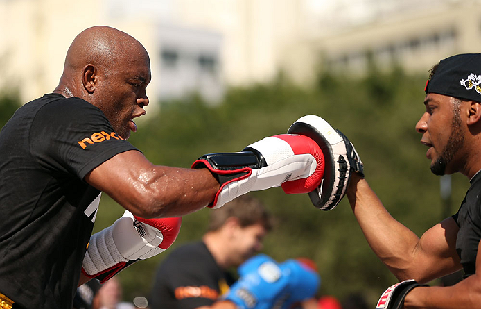 RIO DE JANEIRO, BRAZIL - OCTOBER 10: Anderson Silva works out for fans and media during an open training session ahead of UFC 153 at Arcos da Lapa: Praca Cardeal Camara on October 10, 2012 in Rio de Janeiro, Brazil. (Photo by Josh Hedges/Zuffa LLC/Zuffa LLC via Getty Images)