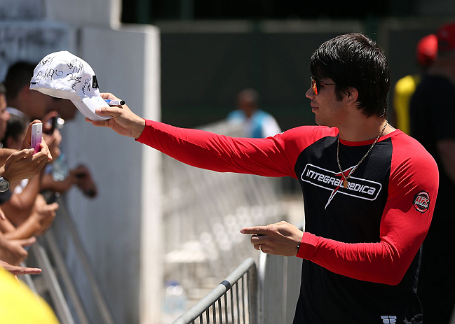 RIO DE JANEIRO, BRAZIL - OCTOBER 10: Erick Silva greets fans before an open training session ahead of UFC 153 at Arcos da Lapa: Praca Cardeal Camara on October 10, 2012 in Rio de Janeiro, Brazil. (Photo by Josh Hedges/Zuffa LLC/Zuffa LLC via Getty Images)