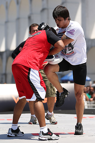 RIO DE JANEIRO, BRAZIL - OCTOBER 10: Erick Silva works out for fans and media during an open training session ahead of UFC 153 at Arcos da Lapa: Praca Cardeal Camara on October 10, 2012 in Rio de Janeiro, Brazil. (Photo by Josh Hedges/Zuffa LLC/Zuffa LLC via Getty Images)