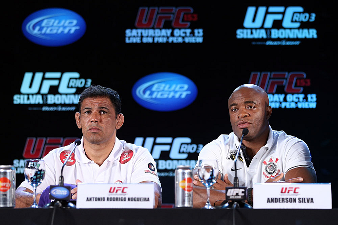 RIO DE JANEIRO, BRAZIL - OCTOBER 11:  (R-L) Anderson Silva and Antonio Rodrigo "Minotauro" Nogueira interact with media during a press conference ahead of UFC 153 at Windsor Barra Hotel on October 11, 2012 in Rio de Janeiro, Brazil.  (Photo by Josh Hedges/Zuffa LLC/Zuffa LLC via Getty Images)