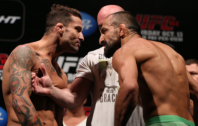 RIO DE JANEIRO, BRAZIL - OCTOBER 12:  (L-R) Opponents Cristiano Marcello and Reza Madadi face off during the UFC 153 weigh in at HSBC Arena on October 12, 2012 in Rio de Janeiro, Brazil.  (Photo by Josh Hedges/Zuffa LLC/Zuffa LLC via Getty Images)