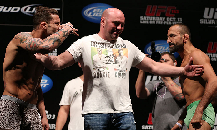 RIO DE JANEIRO, BRAZIL - OCTOBER 12:  Opponents Cristiano Marcello (L) and Reza Madadi (R) are separated by UFC President Dana White during the UFC 153 weigh in at HSBC Arena on October 12, 2012 in Rio de Janeiro, Brazil.  (Photo by Josh Hedges/Zuffa LLC/Zuffa LLC via Getty Images)