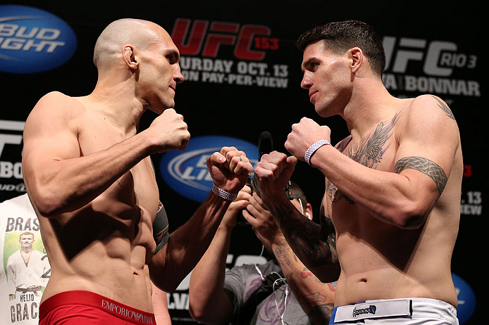 RIO DE JANEIRO, BRAZIL - OCTOBER 12:  (L-R) Opponents Luiz Cane and Chris Camozzi face off during the UFC 153 weigh in at HSBC Arena on October 12, 2012 in Rio de Janeiro, Brazil.  (Photo by Josh Hedges/Zuffa LLC/Zuffa LLC via Getty Images)