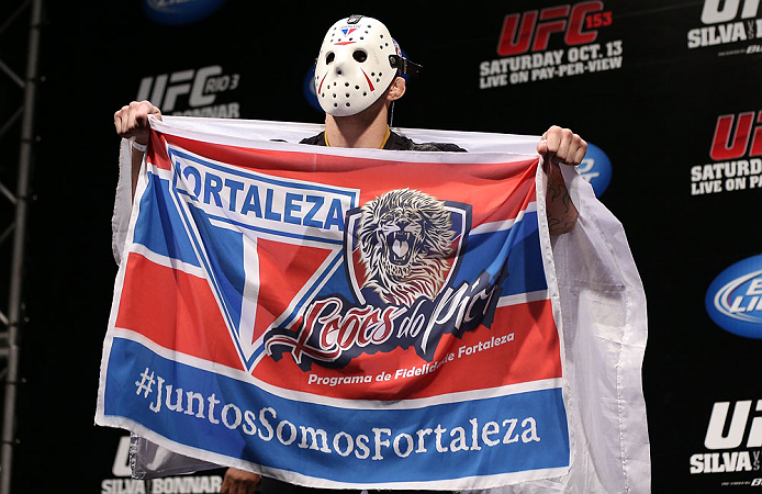 RIO DE JANEIRO, BRAZIL - OCTOBER 12:  Rony "Jason" Mariano Bezerra displays a flag on stage before weighing in during the UFC 153 weigh in at HSBC Arena on October 12, 2012 in Rio de Janeiro, Brazil.  (Photo by Josh Hedges/Zuffa LLC/Zuffa LLC via Getty Images)