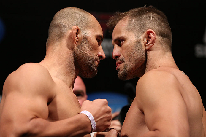RIO DE JANEIRO, BRAZIL - OCTOBER 12:  (L-R) Opponents Glover Teixeira and Fabio Maldonado face off during the UFC 153 weigh in at HSBC Arena on October 12, 2012 in Rio de Janeiro, Brazil.  (Photo by Josh Hedges/Zuffa LLC/Zuffa LLC via Getty Images)
