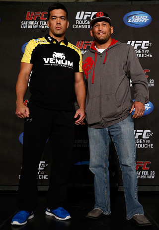 ANAHEIM, CA - FEBRUARY 21: (L-R) Opponents Lyoto Machida and Dan Henderson pose for photos during a UFC pre-fight press conference at Honda Center on February 21, 2013 in Anaheim, California. (Photo by Josh Hedges/Zuffa LLC/Zuffa LLC via Getty Images)