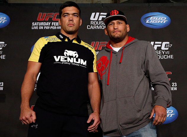 ANAHEIM, CA - FEBRUARY 21: (L-R) Opponents Lyoto Machida and Dan Henderson pose for photos during a UFC pre-fight press conference at Honda Center on February 21, 2013 in Anaheim, California. (Photo by Josh Hedges/Zuffa LLC/Zuffa LLC via Getty Images)