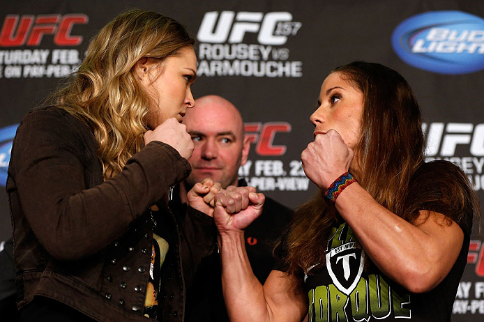 ANAHEIM, CA - FEBRUARY 21: (L-R) Opponents Ronda Rousey and Liz Carmouche face off during a UFC pre-fight press conference at Honda Center on February 21, 2013 in Anaheim, California. (Photo by Josh Hedges/Zuffa LLC/Zuffa LLC via Getty Images)