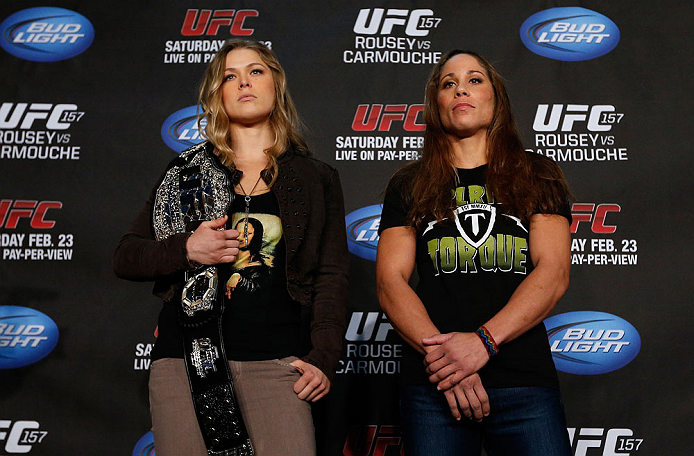 ANAHEIM, CA - FEBRUARY 21: (L-R) Opponents Ronda Rousey and Liz Carmouche pose for photos during a UFC pre-fight press conference at Honda Center on February 21, 2013 in Anaheim, California. (Photo by Josh Hedges/Zuffa LLC/Zuffa LLC via Getty Images)