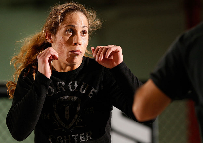 TORRANCE, CA - FEBRUARY 20:  Liz Carmouche conducts an open training session for fans and media at the UFC Gym on February 20, 2013 in Torrance, California.  (Photo by Josh Hedges/Zuffa LLC/Zuffa LLC via Getty Images)