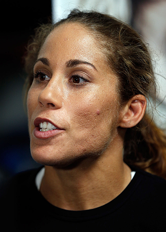 TORRANCE, CA - FEBRUARY 20:  Liz Carmouche interacts with media after an open training session at the UFC Gym on February 20, 2013 in Torrance, California.  (Photo by Josh Hedges/Zuffa LLC/Zuffa LLC via Getty Images)