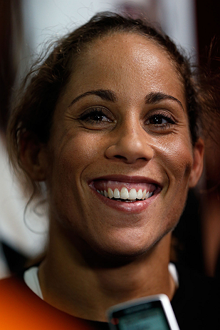 TORRANCE, CA - FEBRUARY 20:  Liz Carmouche interacts with media after an open training session at the UFC Gym on February 20, 2013 in Torrance, California.  (Photo by Josh Hedges/Zuffa LLC/Zuffa LLC via Getty Images)