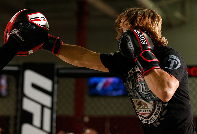 TORRANCE, CA - FEBRUARY 20:  Urijah Faber conducts an open training session for fans and media at the UFC Gym on February 20, 2013 in Torrance, California.  (Photo by Josh Hedges/Zuffa LLC/Zuffa LLC via Getty Images)