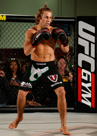 TORRANCE, CA - FEBRUARY 20:  Urijah Faber conducts an open training session for fans and media at the UFC Gym on February 20, 2013 in Torrance, California.  (Photo by Josh Hedges/Zuffa LLC/Zuffa LLC via Getty Images)