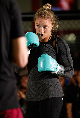 TORRANCE, CA - FEBRUARY 20:  Ronda Rousey conducts an open training session for fans and media at the UFC Gym on February 20, 2013 in Torrance, California.  (Photo by Josh Hedges/Zuffa LLC/Zuffa LLC via Getty Images)