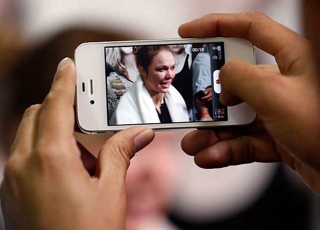 TORRANCE, CA - FEBRUARY 20:  Ronda Rousey interacts with media after an open training session at the UFC Gym on February 20, 2013 in Torrance, California.  (Photo by Josh Hedges/Zuffa LLC/Zuffa LLC via Getty Images)
