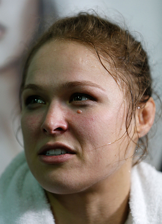 TORRANCE, CA - FEBRUARY 20:  Ronda Rousey interacts with media after an open training session at the UFC Gym on February 20, 2013 in Torrance, California.  (Photo by Josh Hedges/Zuffa LLC/Zuffa LLC via Getty Images)