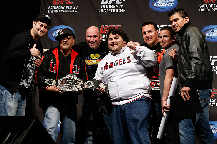 ANAHEIM, CA - FEBRUARY 22:  UFC President Dana White poses for photos with fans during a Q&A session before the UFC 157 weigh-in at Honda Center on February 22, 2013 in Anaheim, California.  (Photo by Josh Hedges/Zuffa LLC/Zuffa LLC via Getty Images)