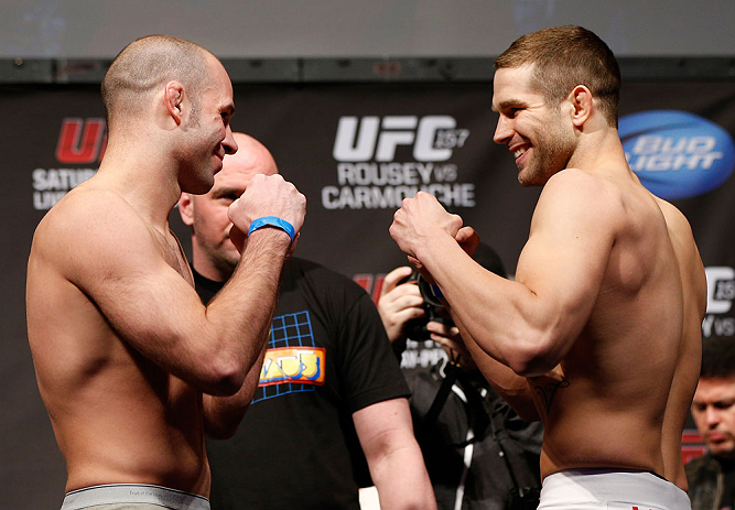 ANAHEIM, CA - FEBRUARY 22:  (L-R) Opponents Kenny Robertson and Brock Jardine face off during the UFC 157 weigh-in at Honda Center on February 22, 2013 in Anaheim, California.  (Photo by Josh Hedges/Zuffa LLC/Zuffa LLC via Getty Images)