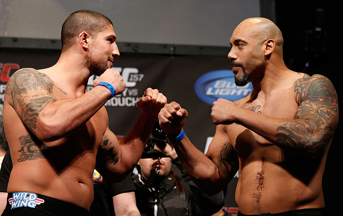 ANAHEIM, CA - FEBRUARY 22:  (L-R) Opponents Brendan Schaub and Lavar Johnson face off during the UFC 157 weigh-in at Honda Center on February 22, 2013 in Anaheim, California.  (Photo by Josh Hedges/Zuffa LLC/Zuffa LLC via Getty Images)
