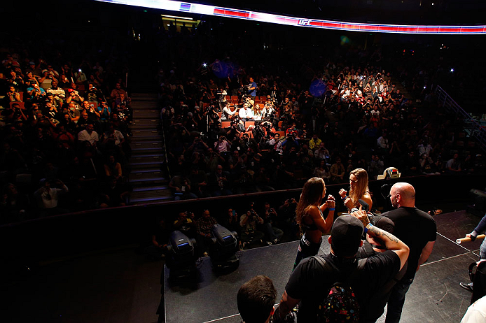 ANAHEIM, CA - FEBRUARY 22:  (R-L) Opponents Ronda Rousey and Liz Carmouche face off during the UFC 157 weigh-in at Honda Center on February 22, 2013 in Anaheim, California.  (Photo by Josh Hedges/Zuffa LLC/Zuffa LLC via Getty Images)