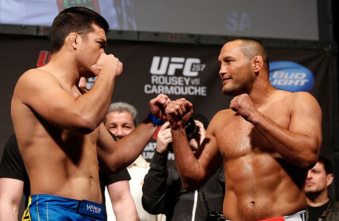 ANAHEIM, CA - FEBRUARY 22:  (L-R) Opponents Lyoto Machida and Dan Henderson face off during the UFC 157 weigh-in at Honda Center on February 22, 2013 in Anaheim, California.  (Photo by Josh Hedges/Zuffa LLC/Zuffa LLC via Getty Images)