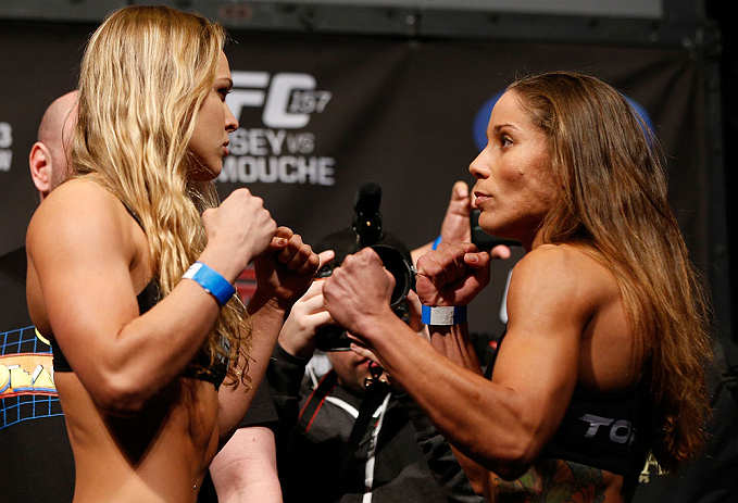 ANAHEIM, CA - FEBRUARY 22:  (L-R) Opponents Ronda Rousey and Liz Carmouche face off during the UFC 157 weigh-in at Honda Center on February 22, 2013 in Anaheim, California.  (Photo by Josh Hedges/Zuffa LLC/Zuffa LLC via Getty Images)