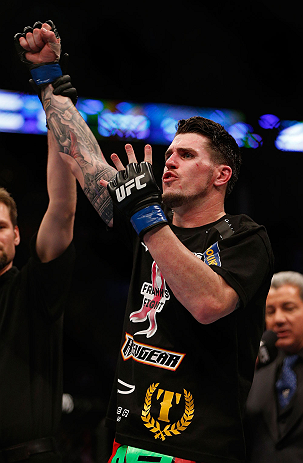 Chris Camozzi reacts after defeating <a href='../fighter/Nick-Ring'><a href='../fighter/Nick-Ring'>Nick Ring</a></a> in their middleweight bout during the UFC 158 event at Bell Centre on March 16, 2013 in Montreal, Quebec, Canada. (Photo by Josh Hedges/Zuffa LLC)
