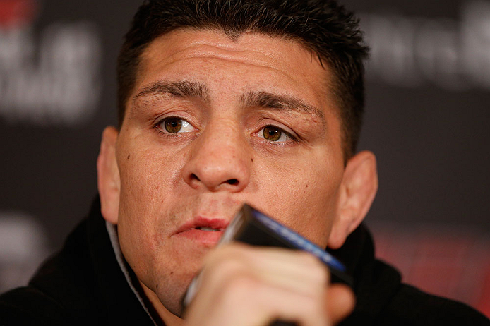 MONTREAL, QC - MARCH 14:  Nick Diaz interacts with media during the final press conference ahead of his UFC 158 bout at Bell Centre on March 14, 2013 in Montreal, Quebec, Canada.  (Photo by Josh Hedges/Zuffa LLC/Zuffa LLC via Getty Images)