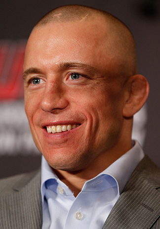 MONTREAL, QC - MARCH 14:  Georges St-Pierre interacts with media during the final press conference ahead of his UFC 158 bout at Bell Centre on March 14, 2013 in Montreal, Quebec, Canada.  (Photo by Josh Hedges/Zuffa LLC/Zuffa LLC via Getty Images)