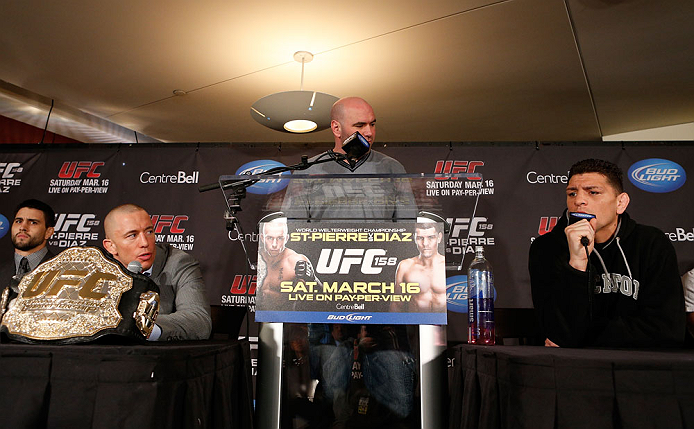 MONTREAL, QC - MARCH 14:  Nick Diaz (R) and Georges St-Pierre (L) argue with each other during the final press conference ahead of his UFC 158 bout at Bell Centre on March 14, 2013 in Montreal, Quebec, Canada.  (Photo by Josh Hedges/Zuffa LLC/Zuffa LLC via Getty Images)