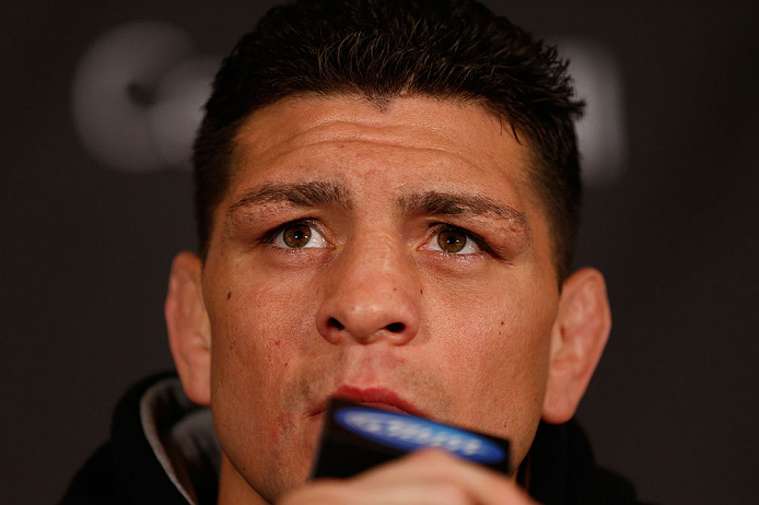 MONTREAL, QC - MARCH 14:  Nick Diaz interacts with media during the final press conference ahead of his UFC 158 bout at Bell Centre on March 14, 2013 in Montreal, Quebec, Canada.  (Photo by Josh Hedges/Zuffa LLC/Zuffa LLC via Getty Images)