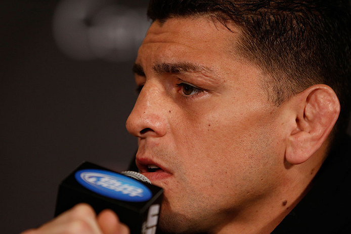 MONTREAL, QC - MARCH 14:  Nick Diaz interacts with media during the final press conference ahead of his UFC 158 bout at Bell Centre on March 14, 2013 in Montreal, Quebec, Canada.  (Photo by Josh Hedges/Zuffa LLC/Zuffa LLC via Getty Images)