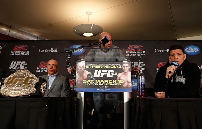 MONTREAL, QC - MARCH 14:  Nick Diaz (R) and Georges St-Pierre (L) argue with each other during the final press conference ahead of his UFC 158 bout at Bell Centre on March 14, 2013 in Montreal, Quebec, Canada.  (Photo by Josh Hedges/Zuffa LLC/Zuffa LLC via Getty Images)